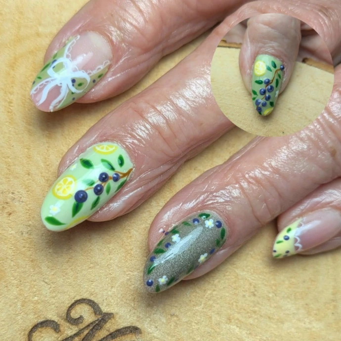 Pose Popit verte nail art fruits raisins citrons fleurs et effet cateye - Némésias Nails